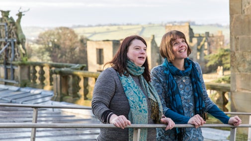 Visitors explore the roof of the hall at Hardwick, Derbyshire